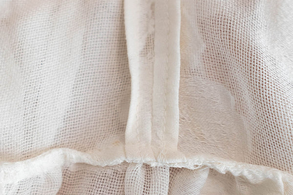 Sheer silk mesh centre back seam from the inside