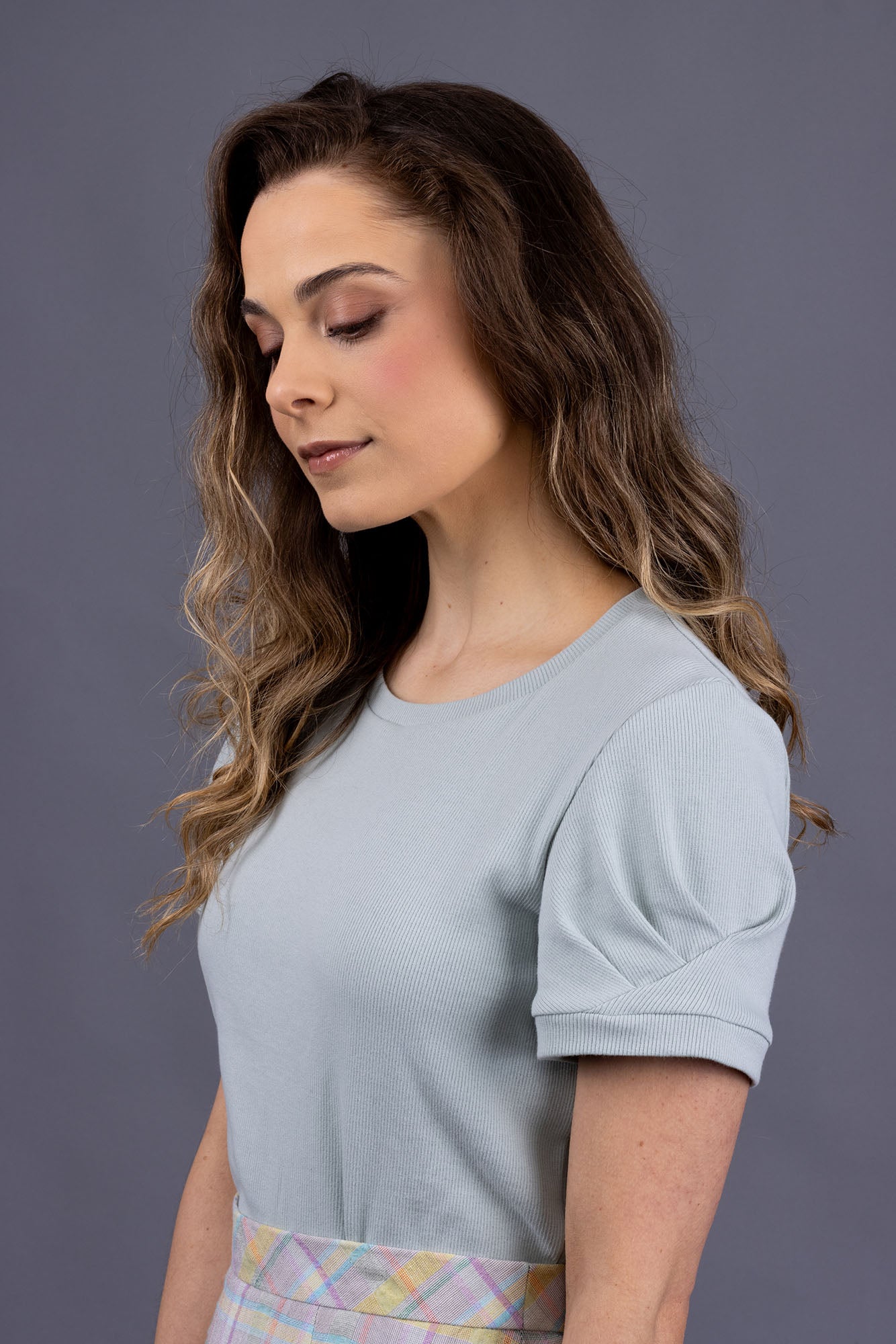 Forget-Me-Not Iris tee pattern with short pleated sleeve in green, close-up side view