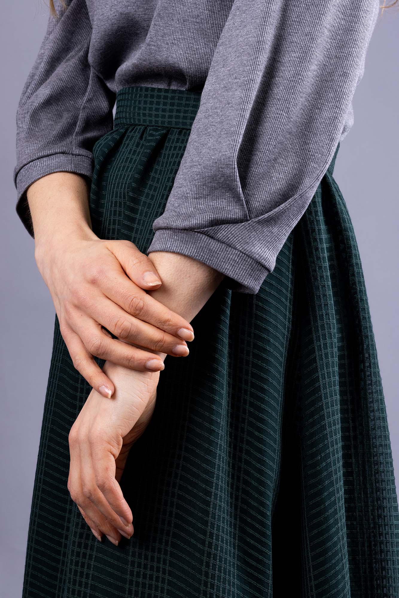 Forget-Me-Not Iris tee pattern with short pleated sleeve in green, close-up side view